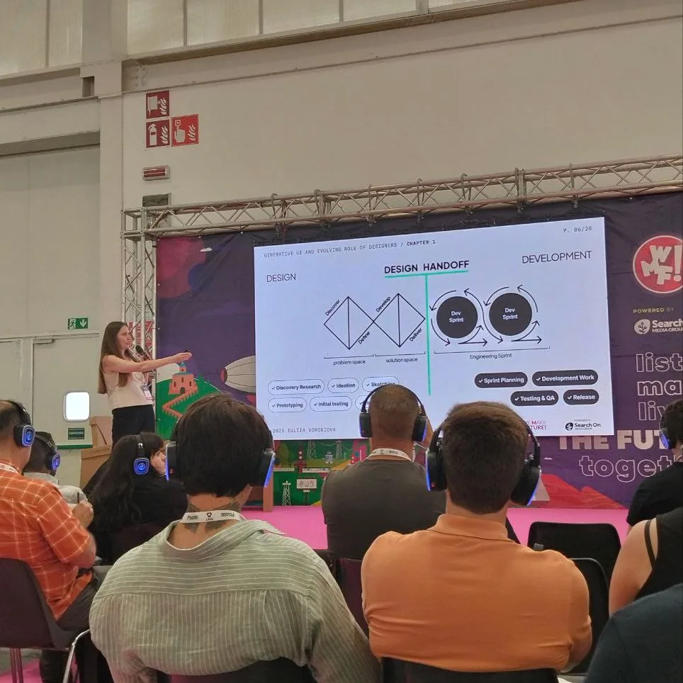 Iuliia Vorobiova presenting on stage at WeMakeFuture